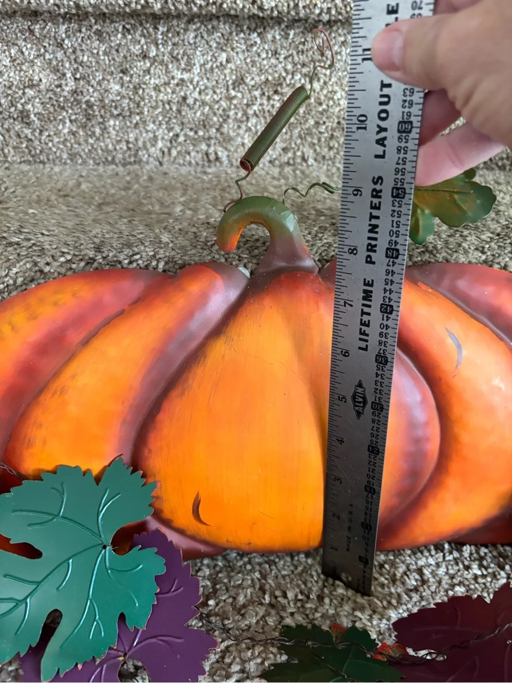 Metal pumpkin and garland